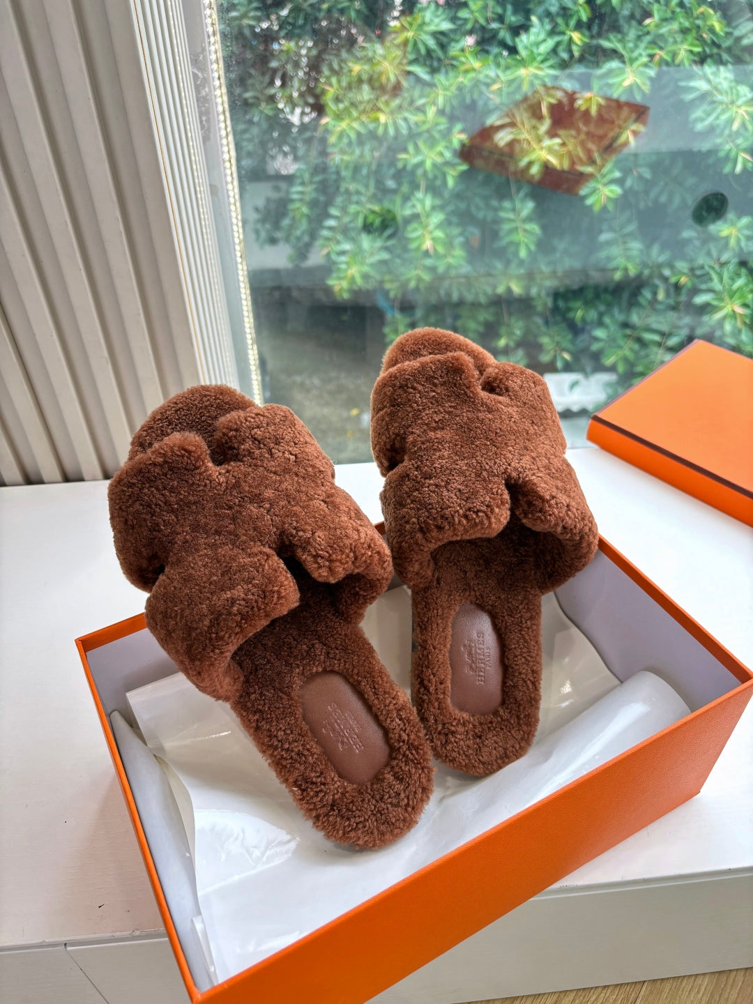 Hermès H-Shaped Fur Slippers – 2025 Collection
