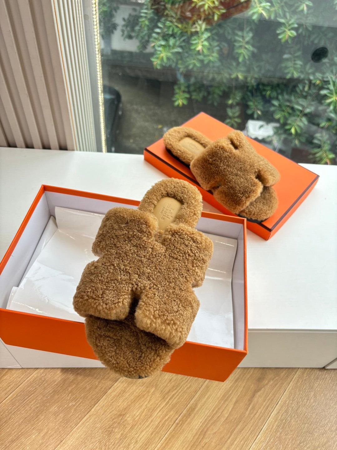 Hermès H-Shaped Fur Slippers – 2025 Collection