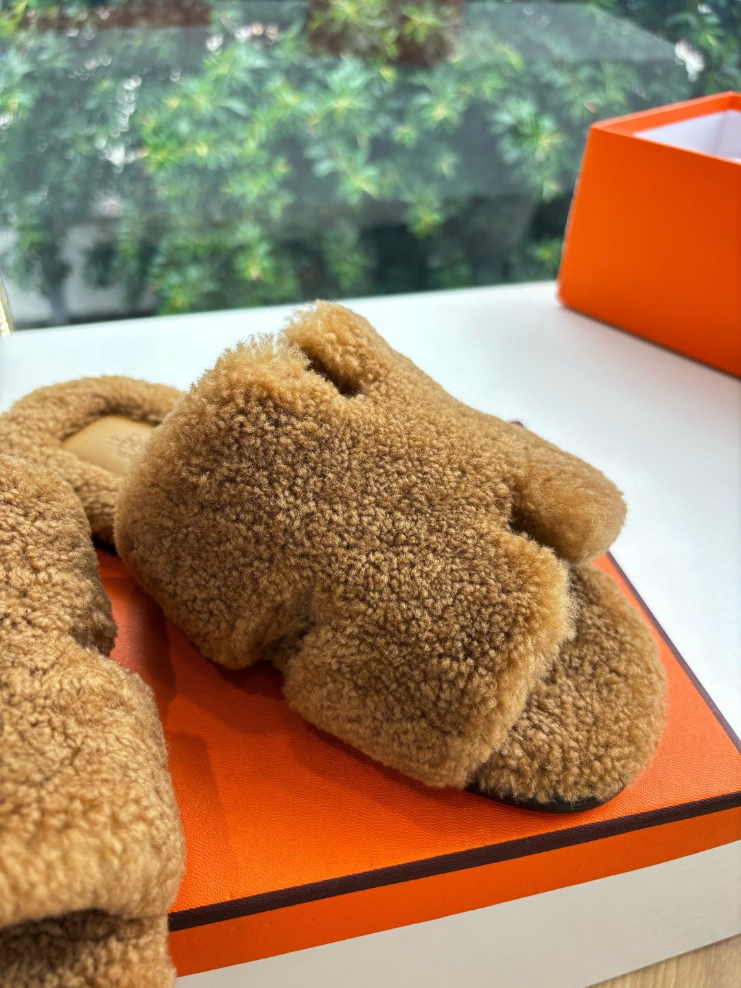 Hermès H-Shaped Fur Slippers – 2025 Collection