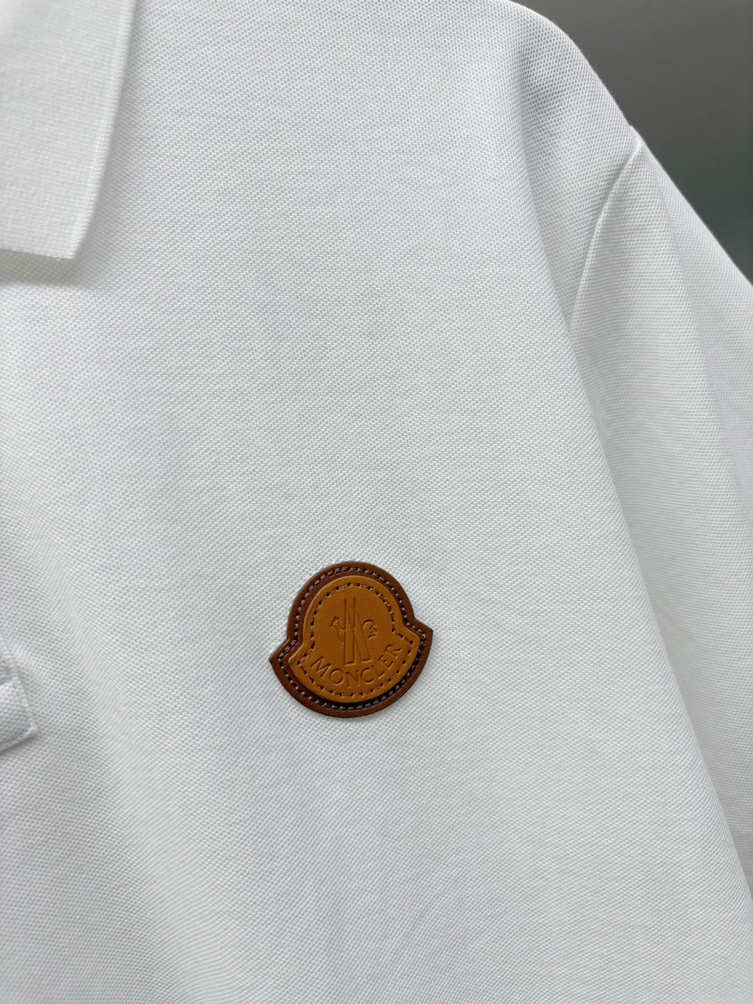 Moncler Leather Logo Patch Polo Shirt – Spring/Summer Collection