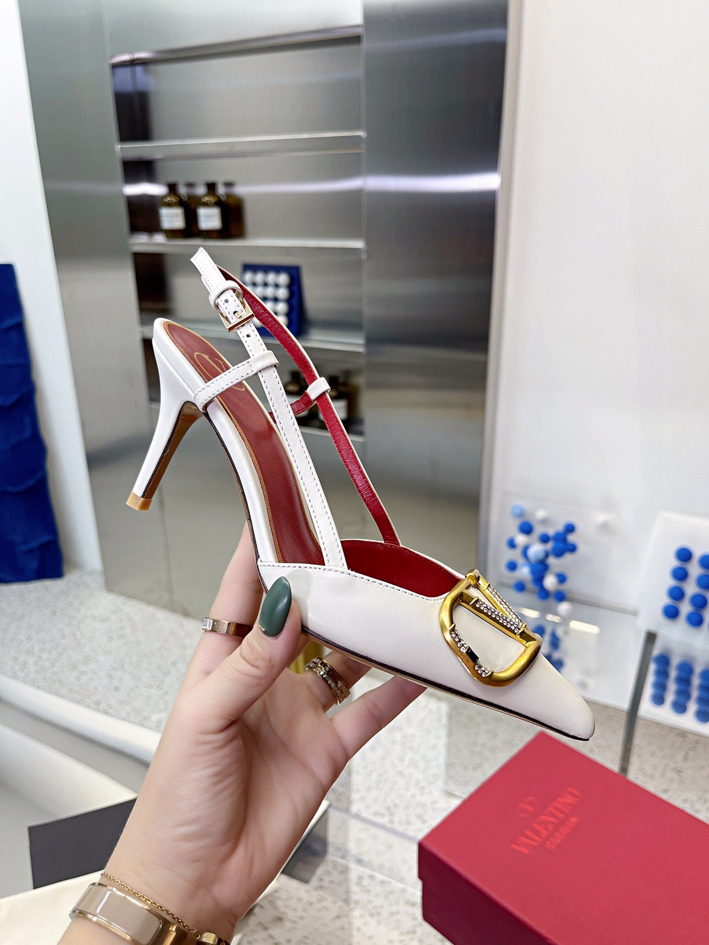 Valentino VLogo Signature Pointed Toe Patent Leather Pumps