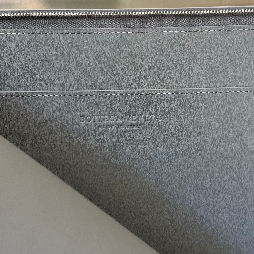Bottega Veneta Intrecciato Half-Zip Clutch Bag
