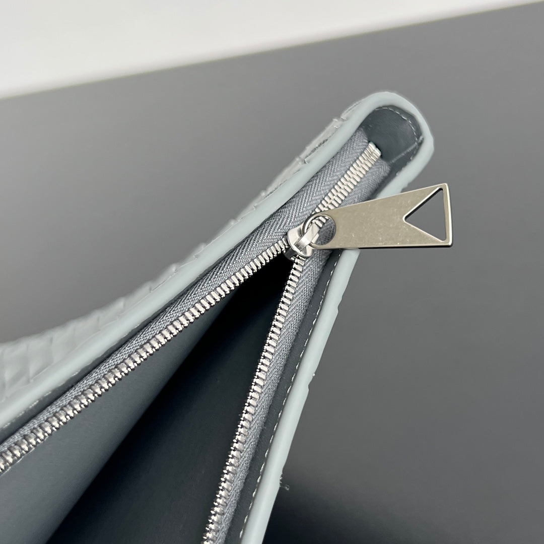 Bottega Veneta Intrecciato Half-Zip Clutch Bag
