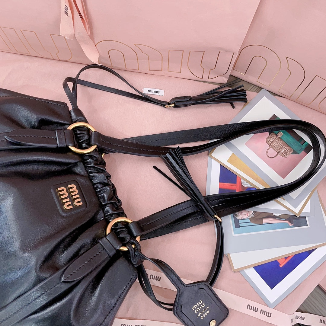 Miu Miu Tassel Drawstring Bucket Bag – New Collection