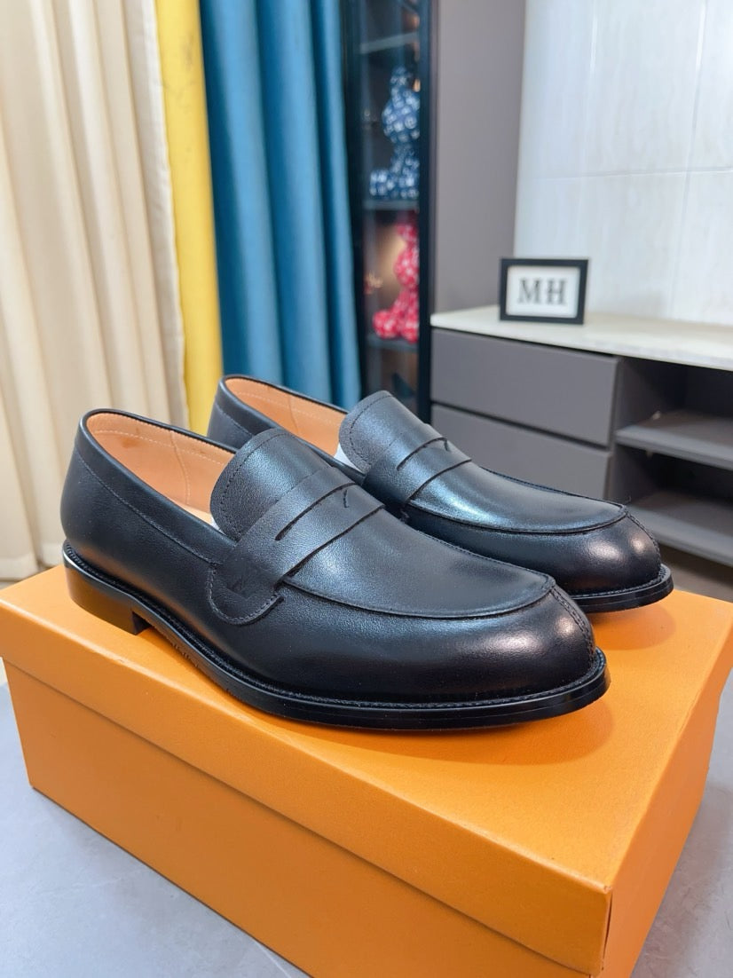 Louis Vuitton Embossed Leather Loafers