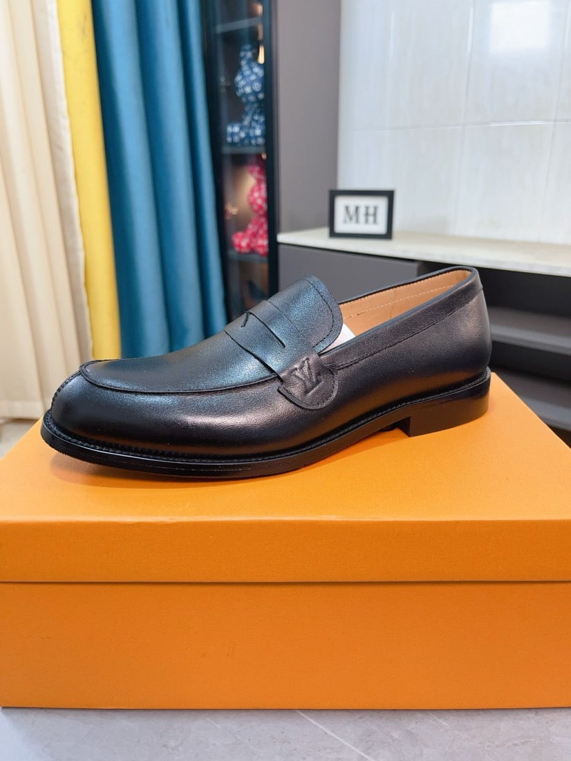 Louis Vuitton Embossed Leather Loafers