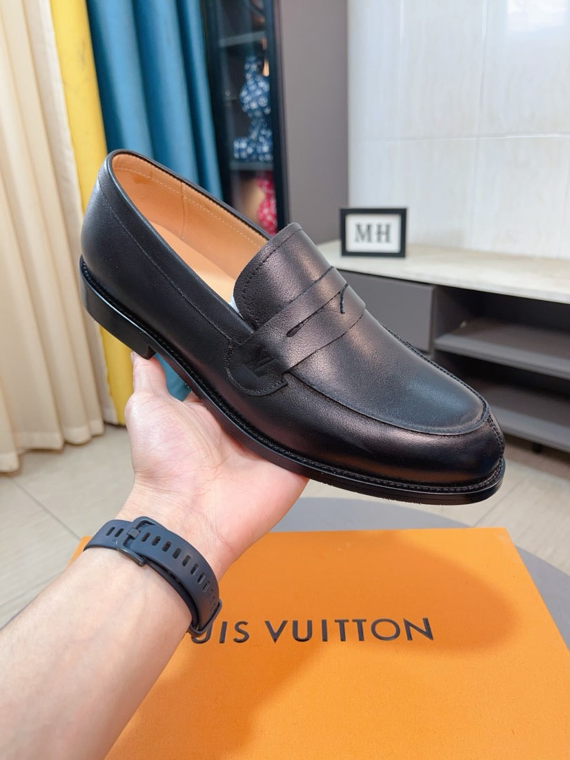 Louis Vuitton Embossed Leather Loafers