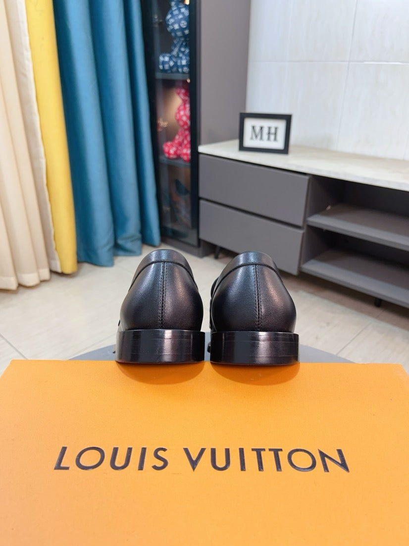 Louis Vuitton Embossed Leather Loafers