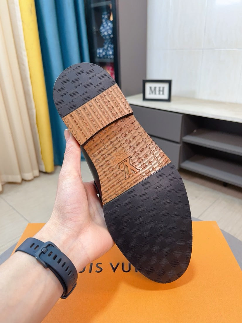 Louis Vuitton Embossed Leather Loafers