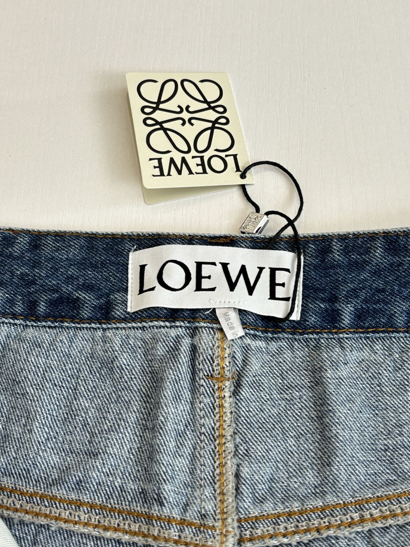 Loewe Anagram Laser-Cut Denim Shorts