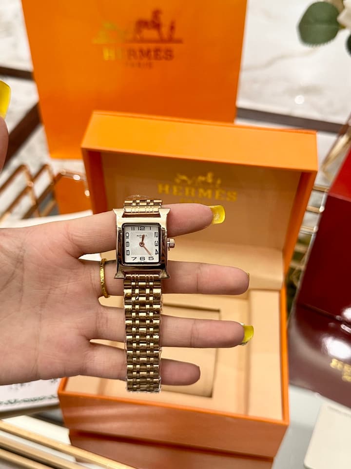 Hermès Small Square Luxury Watch in Dark Dial Patterned Gold Bracelet