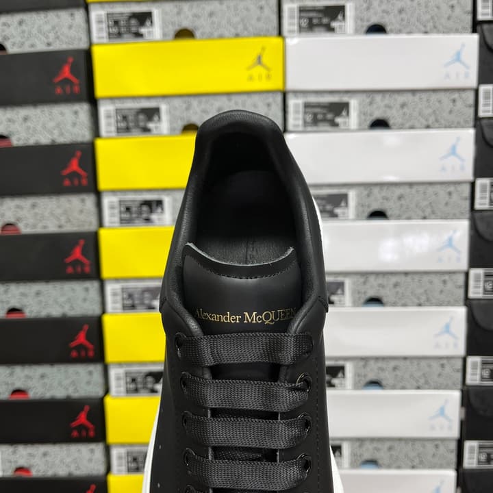 Alexander McQueen Oversized Low-Top Sneakers in All Black With White Sole