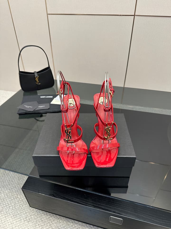 Saint Laurent Patent Leather Heeled Sandals in Bright Amber