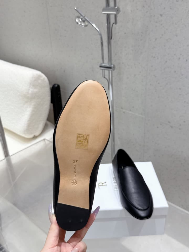 The Row Tassel Loafers in Black Suede