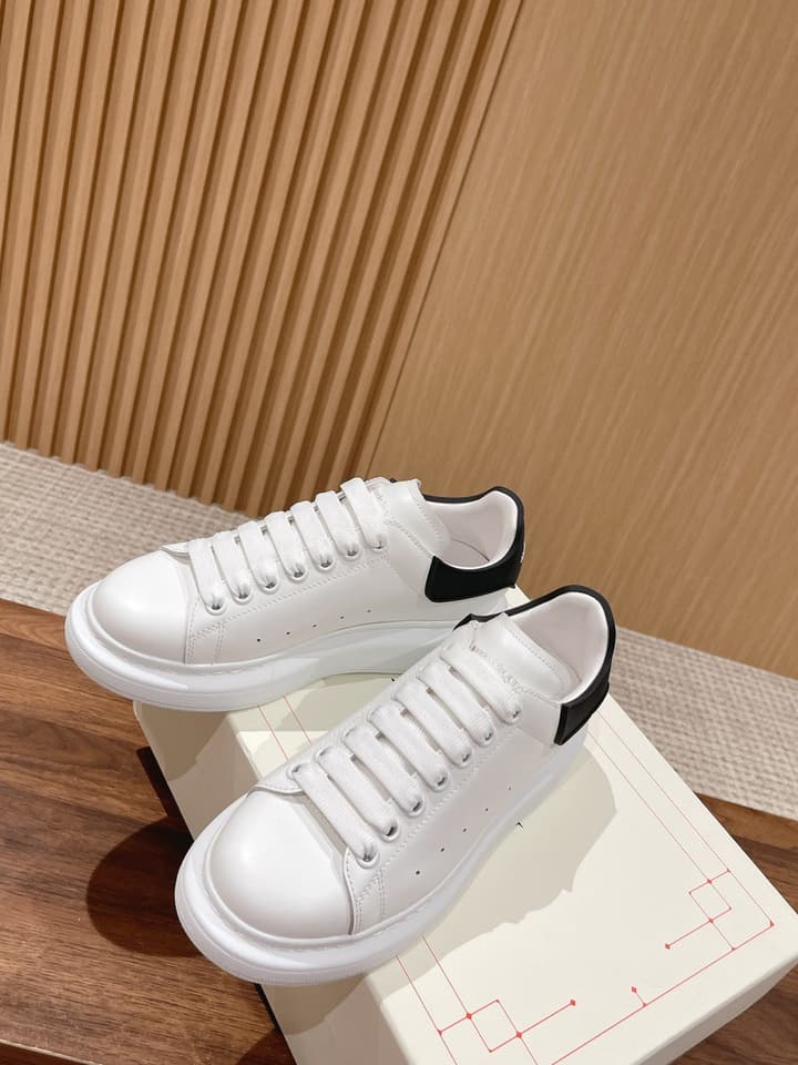 Alexander McQueen Classic Versatile White Sneakers in White With Black Laces & Heel