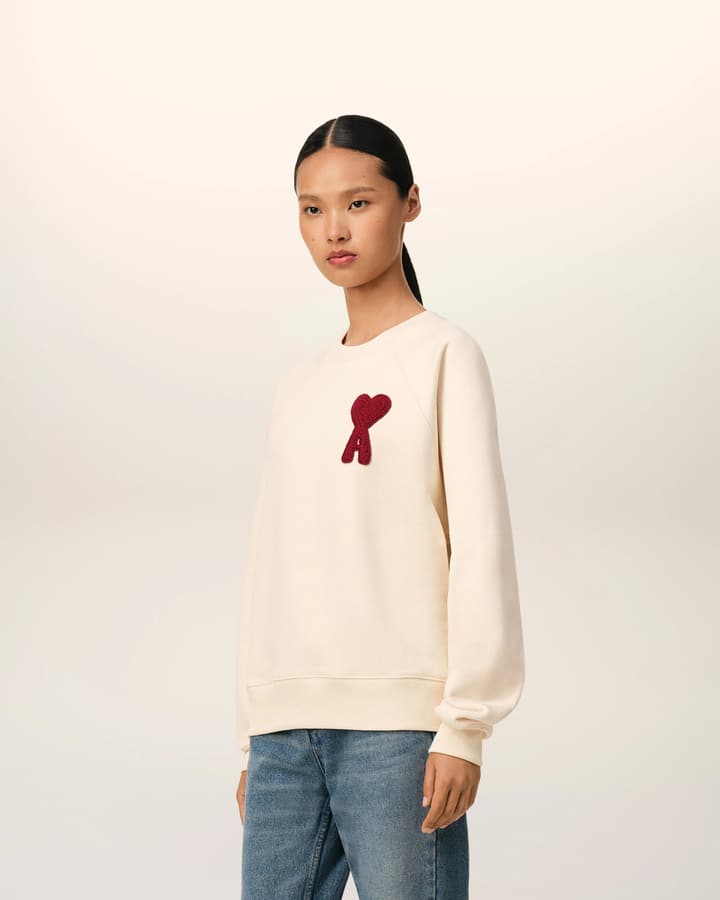 AMI Paris Ami de Coeur Raglan Crewneck Sweatshirt – 25FW in Apricot With Clear Heart
