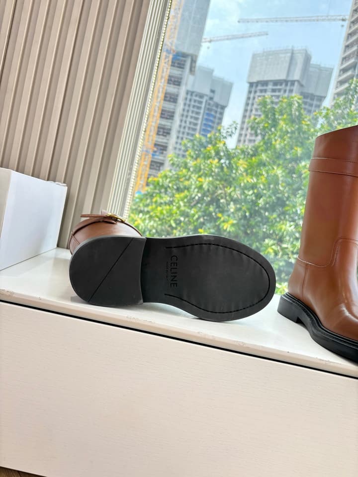 Celine Triomphe Knight Ankle Boots – 2025 Fall/Winter Collection in Black And Brown Leather Display