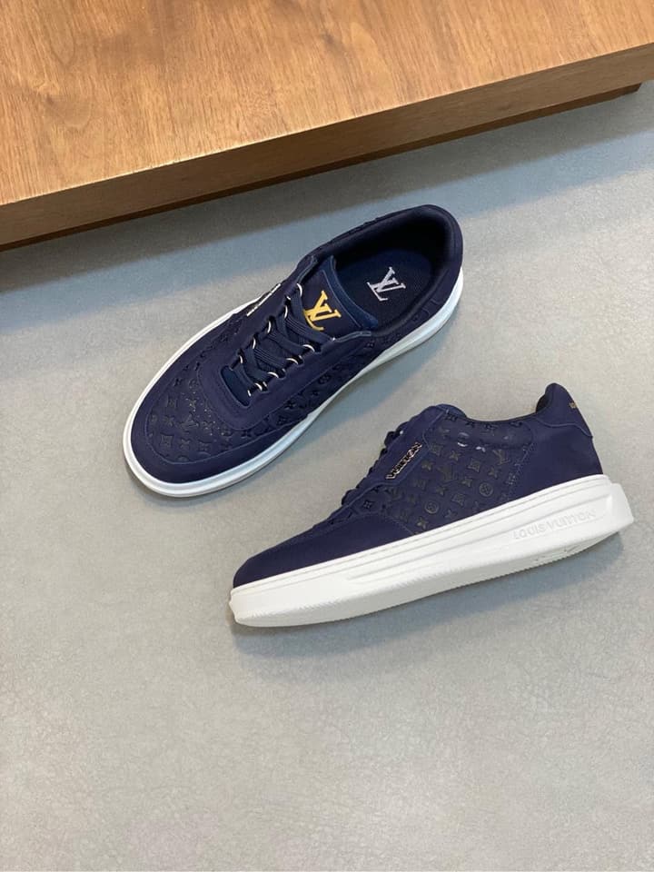 Louis Vuitton Embossed Calfskin Sneakers in Black