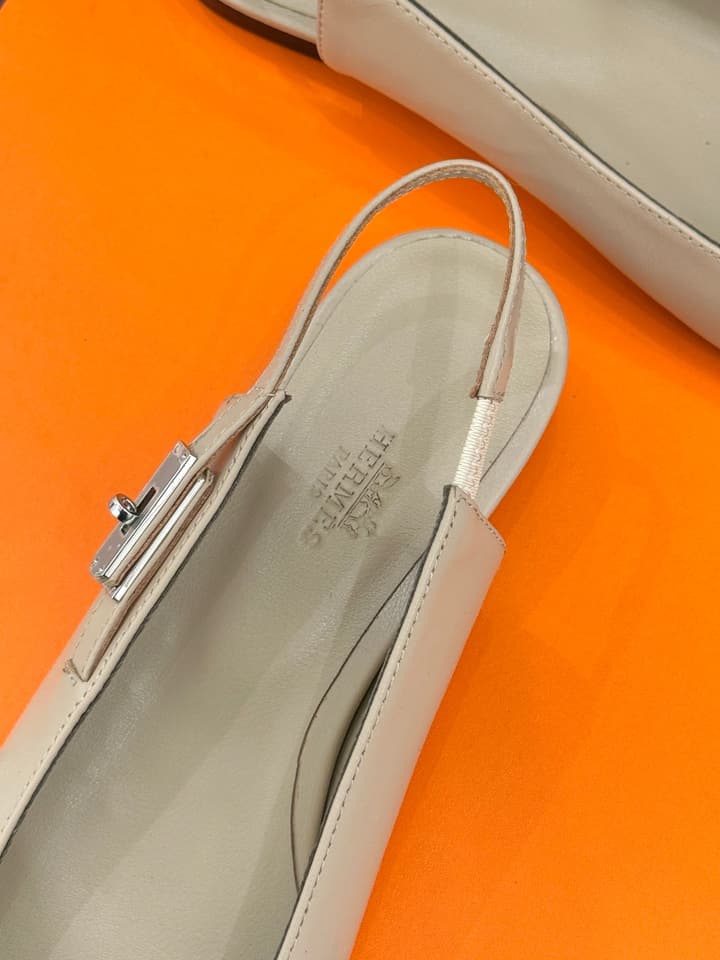 Hermès Kelly Buckle Pointed Toe Flat Sandals in Cream Beige