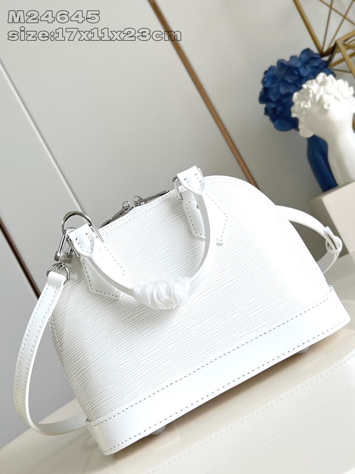 Louis Vuitton Alma BB Handbag in Beige
