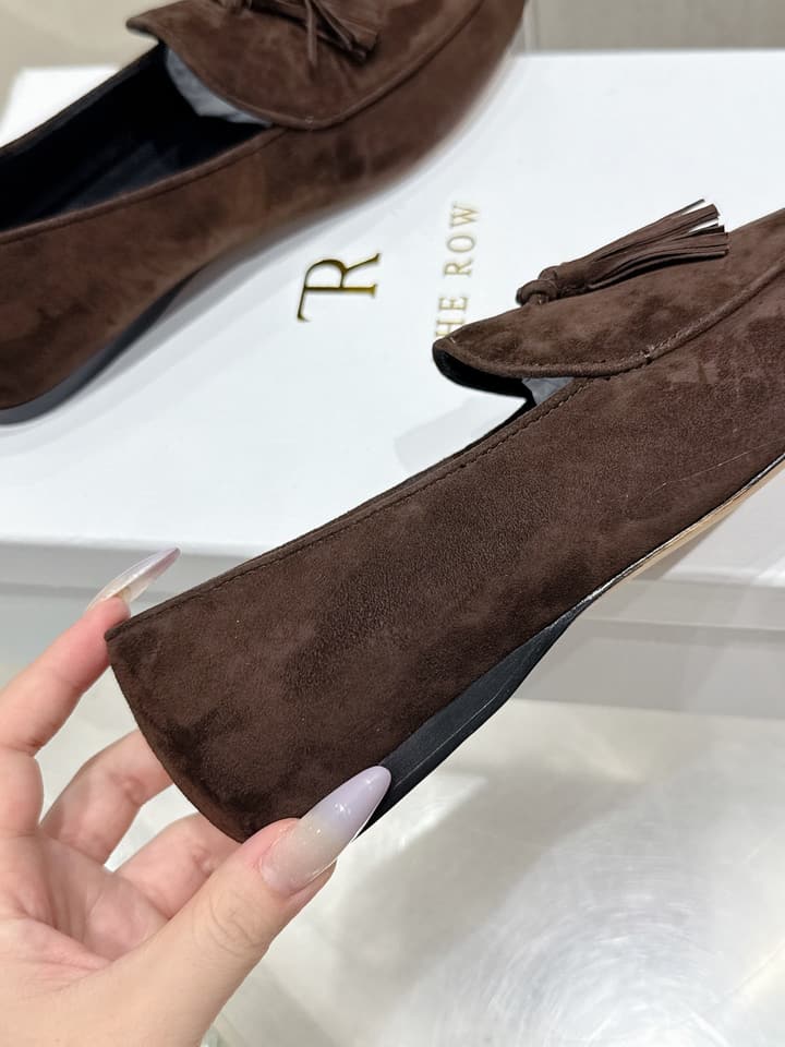 The Row Tassel Loafers in Black Suede