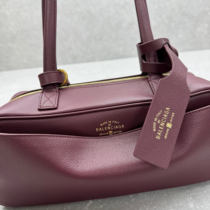Balenciaga Carrie Leather Bowling Bag – Small in Burgundy