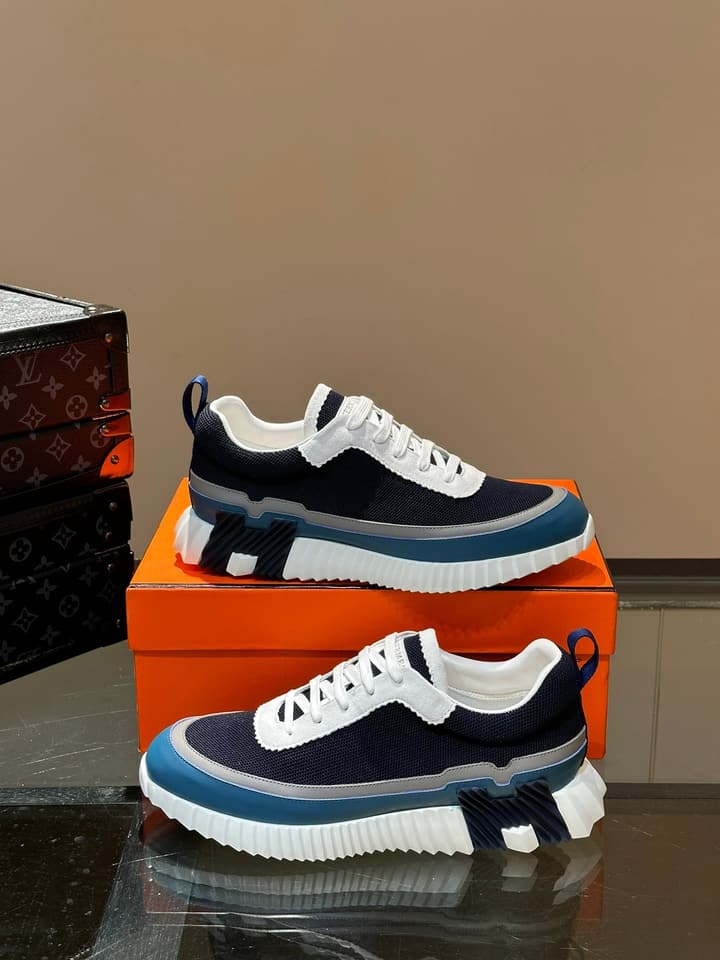 Hermès Bouncing Calfskin Mesh Sneakers in Black With White Stripe