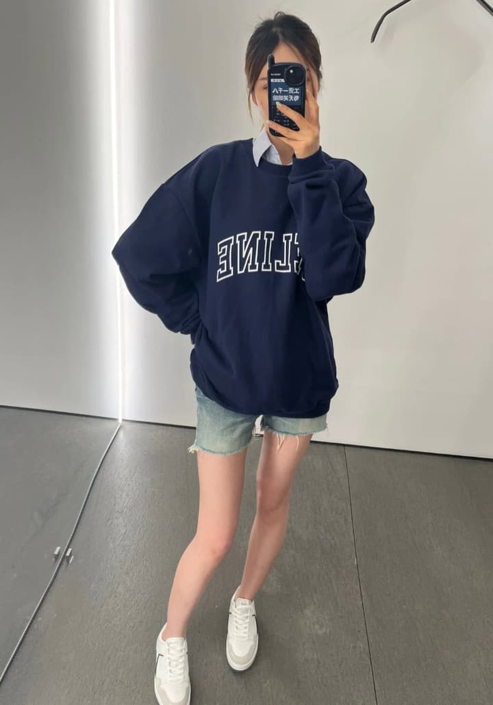 Celine Flocked Letter Pullover Sweatshirt – 2025FW in Navy Blue Folded