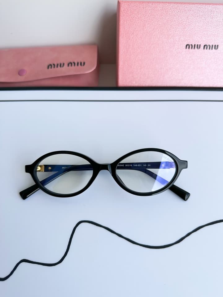 Miu Miu SMU04Z Black Frame Transparent Lens Sunglasses – 2023 Autumn/Winter Collection in Beige