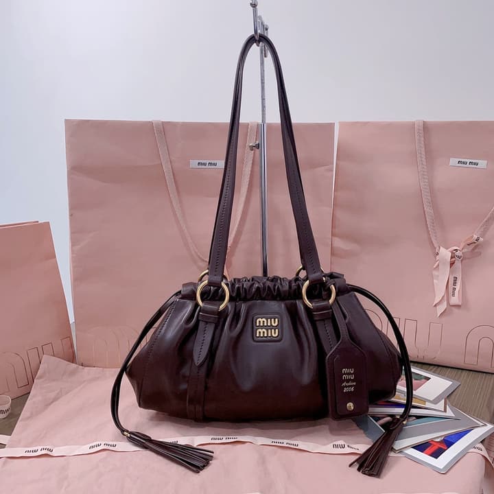 Miu Miu Tassel Drawstring Bucket Bag – New Collection in Black