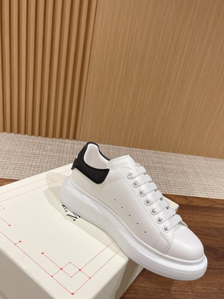 Alexander McQueen Classic Versatile White Sneakers in White With Black Laces & Heel