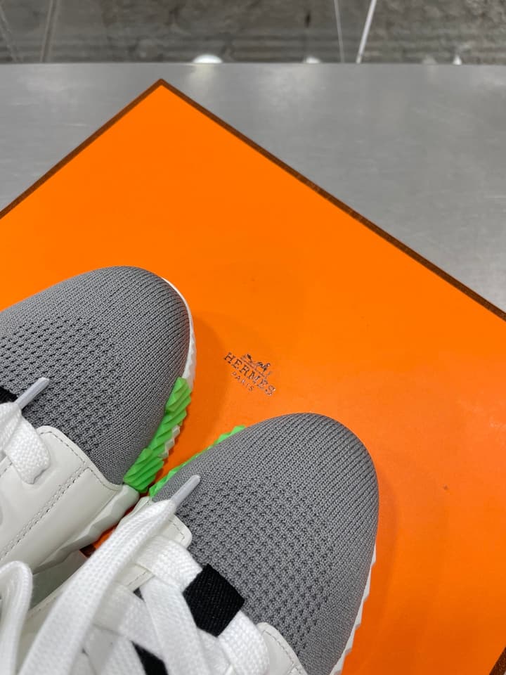 Hermès Sport Sneakers – Iconic Orange Edge in Black Knit With Black Laces