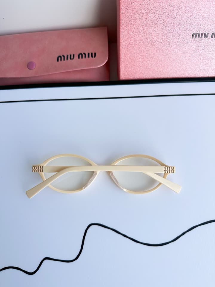 Miu Miu SMU04Z Black Frame Transparent Lens Sunglasses – 2023 Autumn/Winter Collection in Beige