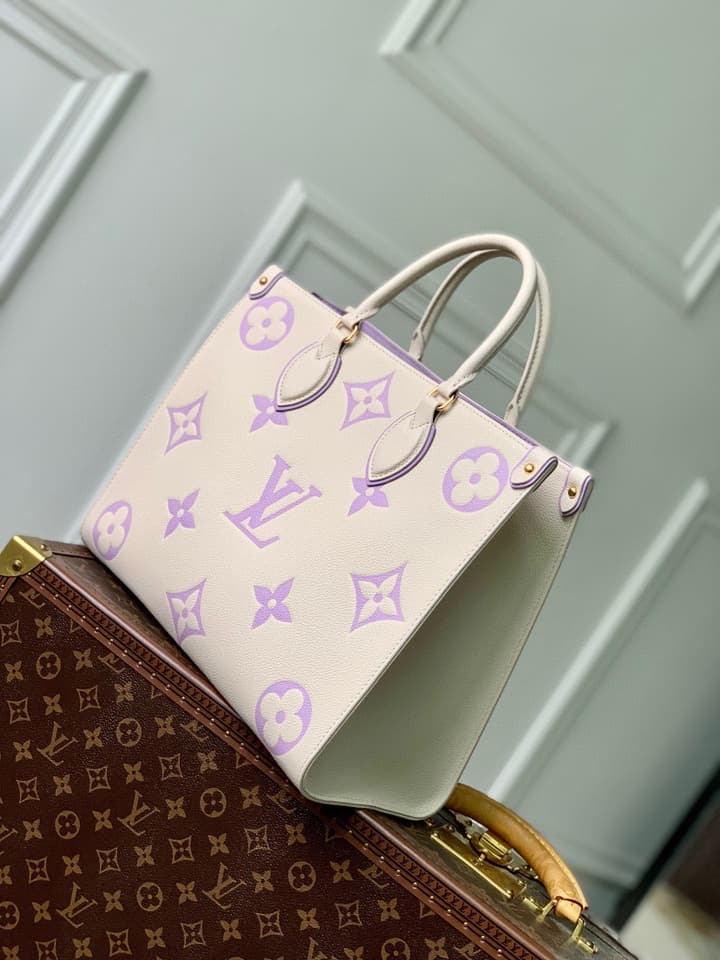 Louis Vuitton ONTHEGO Medium Tote Bag in Cream/white Monogram With Lilac Print