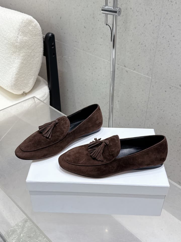 The Row Tassel Loafers in Black Suede