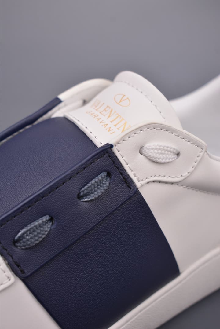 Valentino Rockstud Untitled Rivet Sneakers – 2025 Collection in White With Black Band