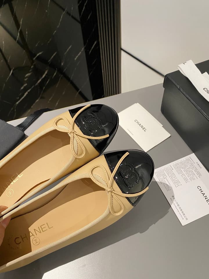 Chanel Classic Ballet Flats in Tan With Black Cap Toe