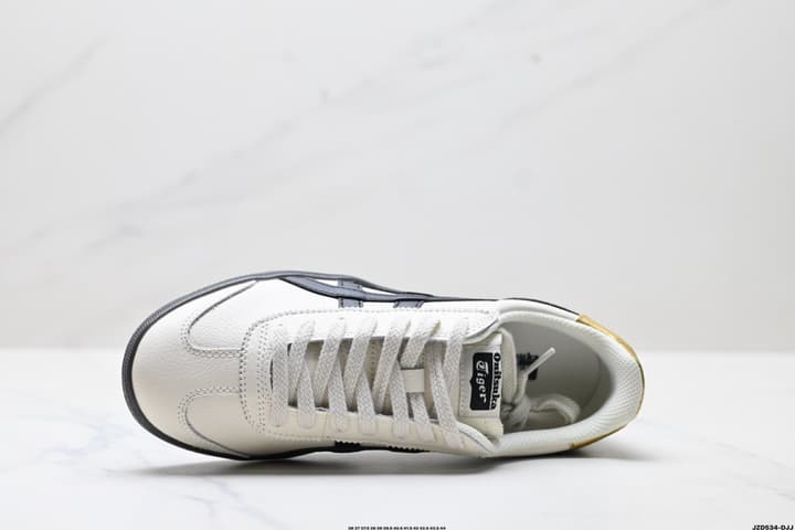 Asics Onitsuka Tiger Tokuten Retro Low-Top Sneakers in Cream Upper With Black Stripes And Black Sole
