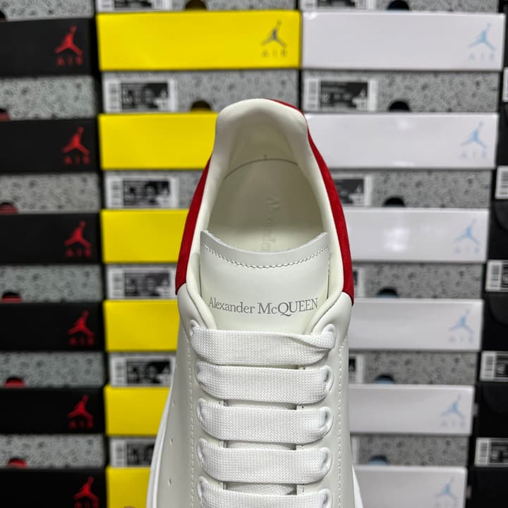 Alexander McQueen Oversized Low-Top Sneakers in All Black With White Sole
