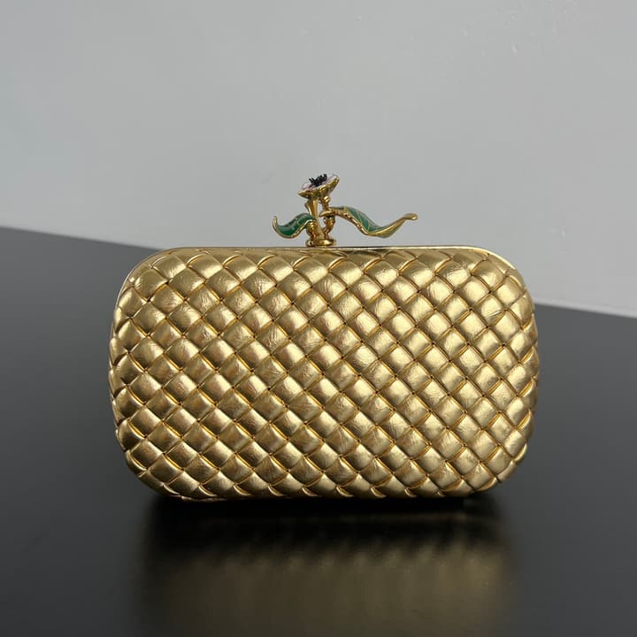 Bottega Veneta Woven Leather Floral Knot Clutch Bag in Gold Woven Leather With Floral Clasp