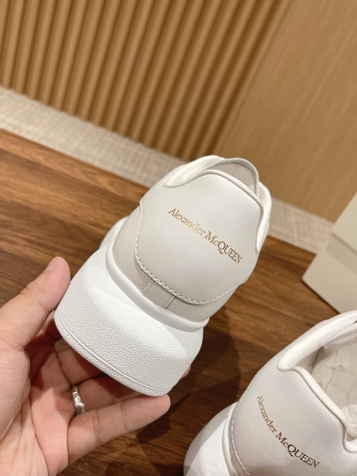 Alexander McQueen Classic Versatile White Sneakers in White With Black Laces & Heel