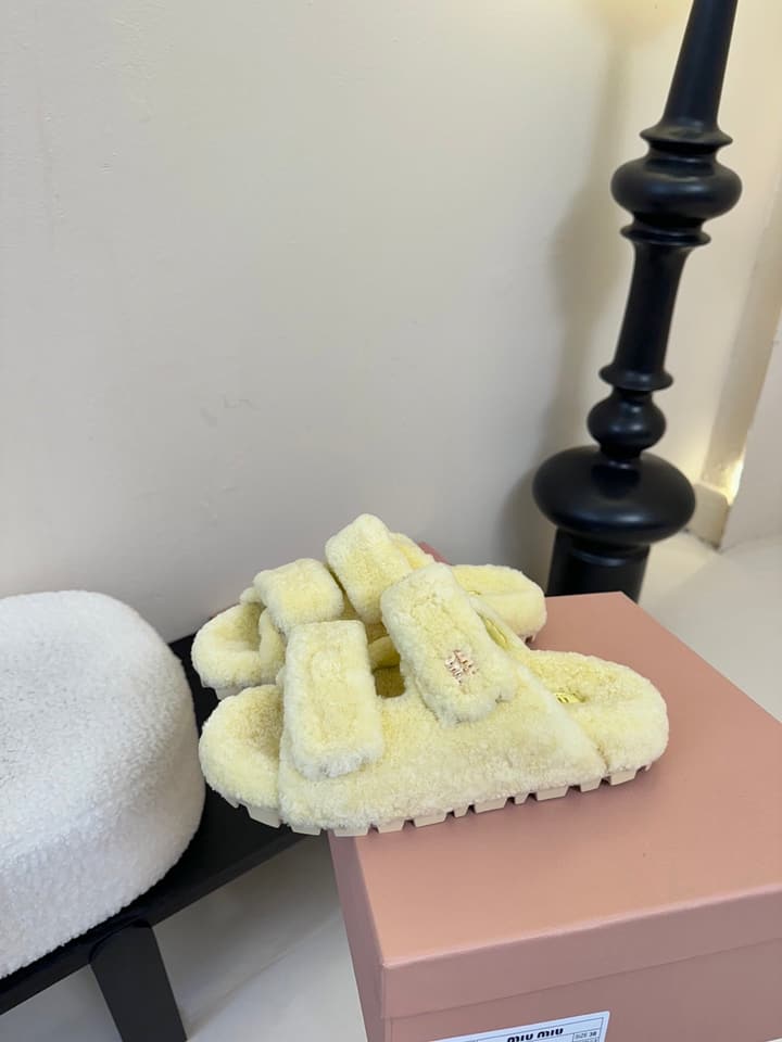 Miu Miu Sheepskin Mules in Black
