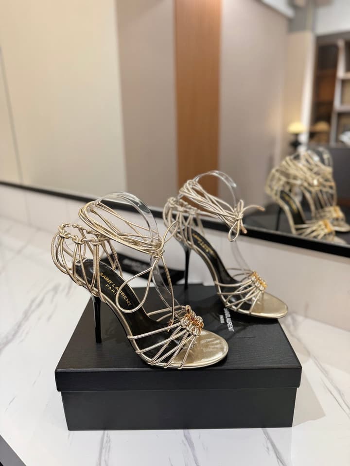 Saint Laurent Letter Buckle Pumps in Bright Gold