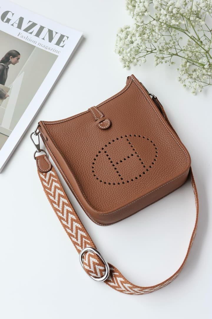 Hermès Mini Evelyne TPM – Gold Brown in Gold Brown With Patterned Strap