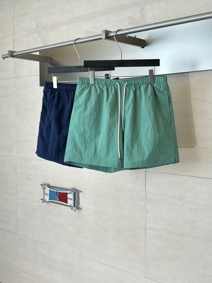 Hermès Embroidered Quick-Dry Beach Shorts in Mint Green