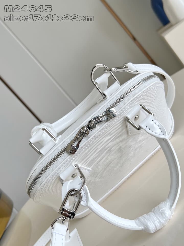 Louis Vuitton Alma BB Handbag in Beige