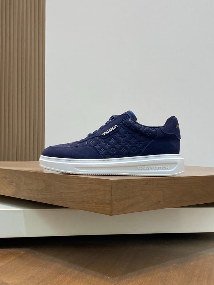 Louis Vuitton Embossed Calfskin Sneakers in Black
