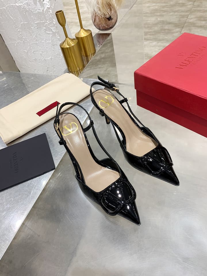Valentino VLogo Pointed-Toe Patent Leather Pumps in Black Patent
