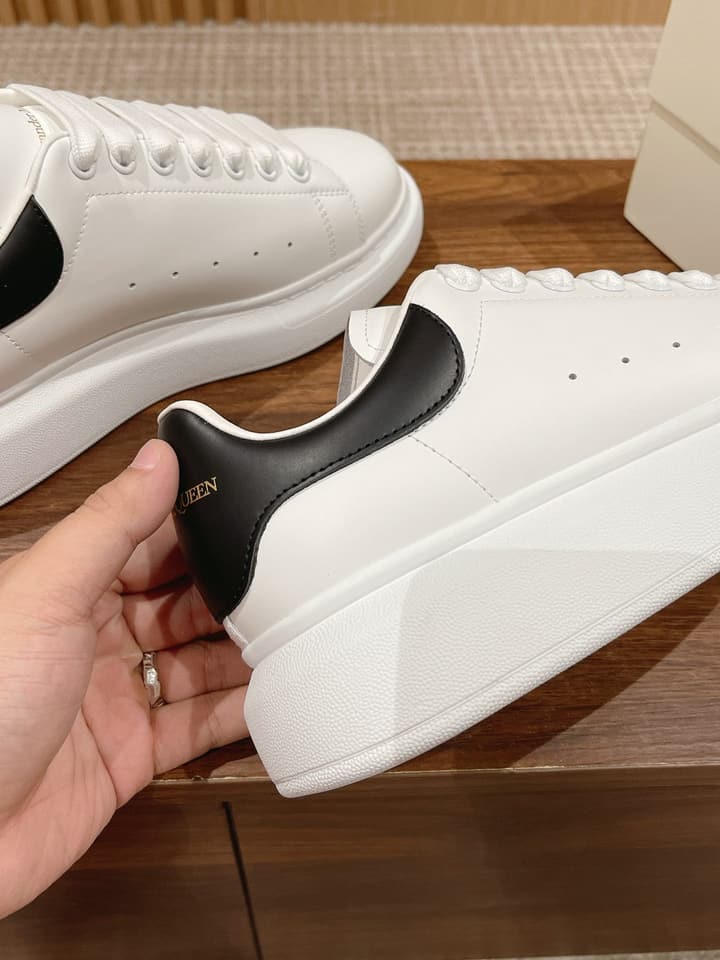Alexander McQueen Classic Versatile White Sneakers in White With Black Laces & Heel