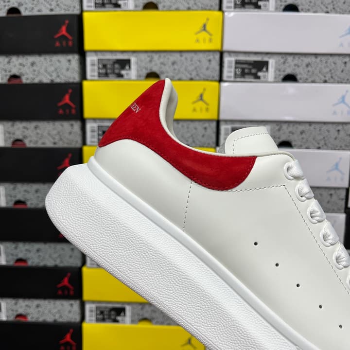 Alexander McQueen Oversized Low-Top Sneakers in All Black With White Sole